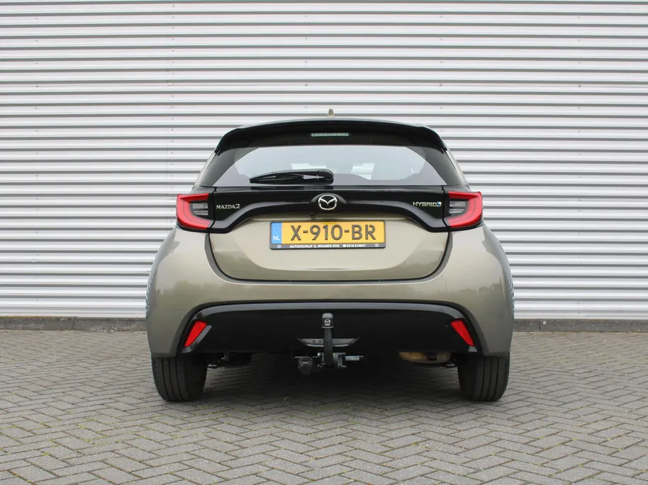 Mazda 2 Hybrid 1.5 Agile | Comfort pakket | Trekhaak | CarPlay | Camera | Stuur-/stoelverwarming | Cruise adapt. | 15' LM |