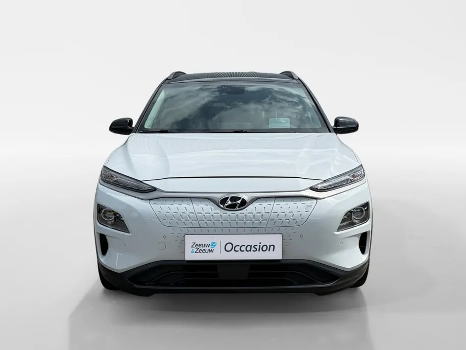 Hyundai Kona EV Premium 64 kWh | Achteruitrijcamera | Head Up Display | Dodehoek Detectie | Lederen Bekleding | Climate Control |