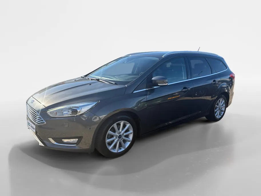 Ford Focus Wagon 1.0 Titanium |Lederen/stof bekleding| Trekhaak| bi-xenon koplampen| keyless entry| 12 maanden Bovag garantie|