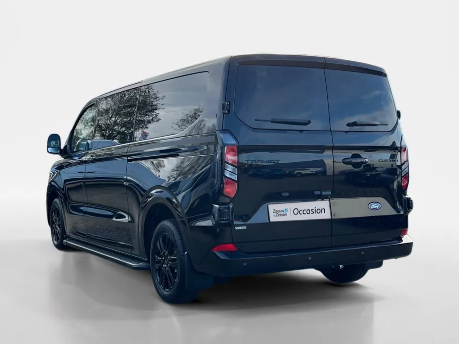 Ford Transit Custom 320 2.5 PHEV L2H1 Black Platinum DC EXCL. BTW &  | 233 pk Automaat | Lederen bekleding | Navigatie | Treeplanken | LM velgen 17' zwart | 360 graden camera | Dubbele schuifdeur