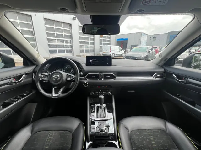 Mazda CX-5 2.0 e-SkyActiv-G M Hybrid 165 Newground AUTOMAAT | TREKHAAK | 360gr. CAMERA | NAVIGATIE | APPLE + ANDROID | HEAD-UP DISPLAY | 19'LM VELGEN | EL.A. KLEP |