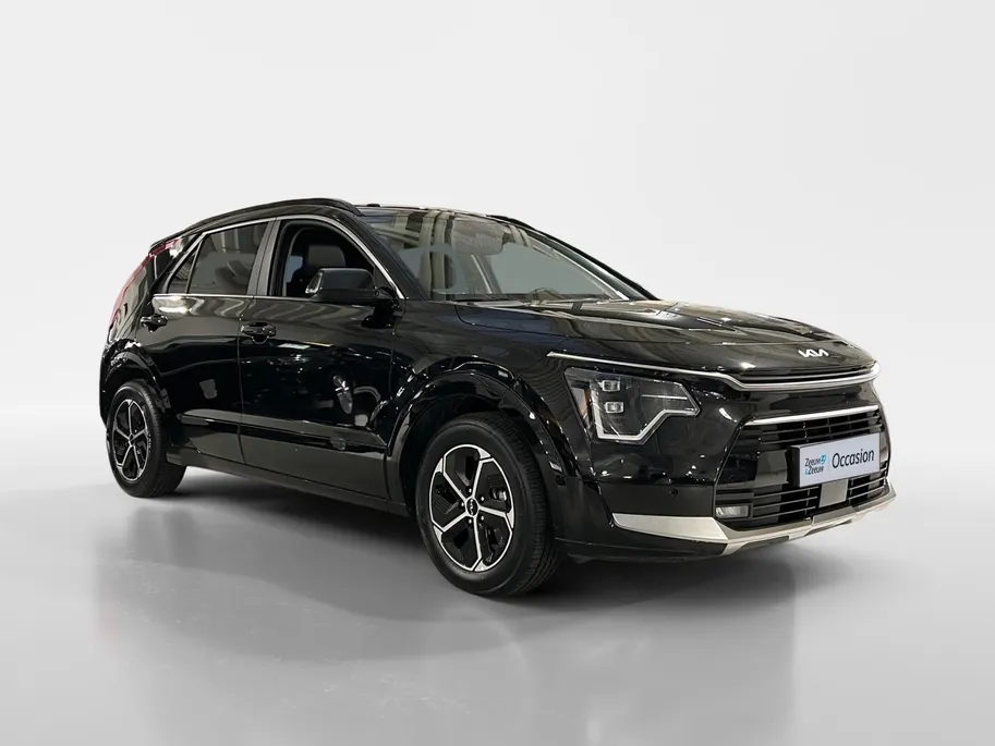 Kia Niro 1.6 GDi Hybrid DynamicPlusLine | Navigatiesysteem | Apple Carplay / Android Auto | Licht + Regensensor | Stoel + Stuurverwarming| Elektrisch bedienbaar Schuifdak | Elektrische Achterklep | Parkeersensoren Voor + Achter | Cruise Control Adaptief | Rijstroo