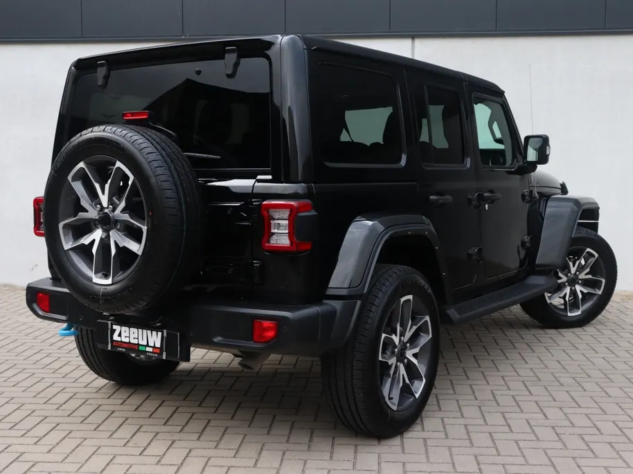 Jeep Wrangler Unlimited 4xe 380 PK Sahara | Leder | Camera | Navi | Carplay | 20'