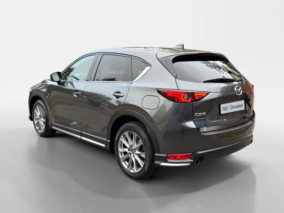 Mazda CX-5 2.0 SkyActiv-G 165 Signature | Schuif/kanteldak | 360 graden camera | Wegklapbare Trekhaak | Adaptieve Cruise Control | Navigatie | BOSE | Leder | 19' Lichtmetalen velgen
