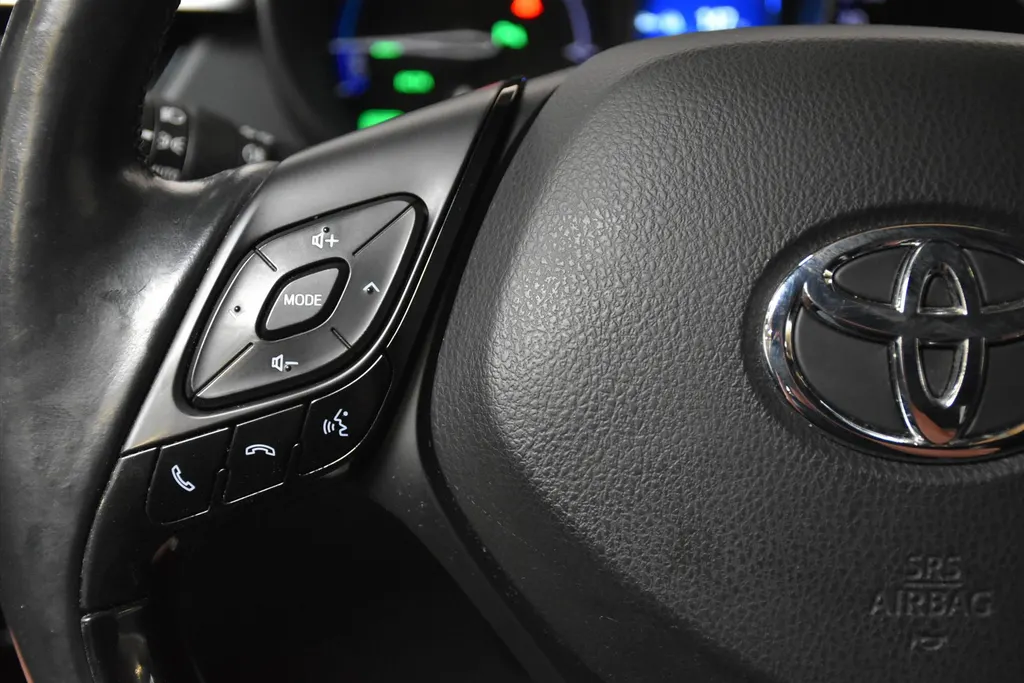 Toyota C-HR 1.8 Hybrid 122pk CVT Bi-Tone Navigatie | Cruise | Clima | PDC |Half Leer | Parlemoer Wit
