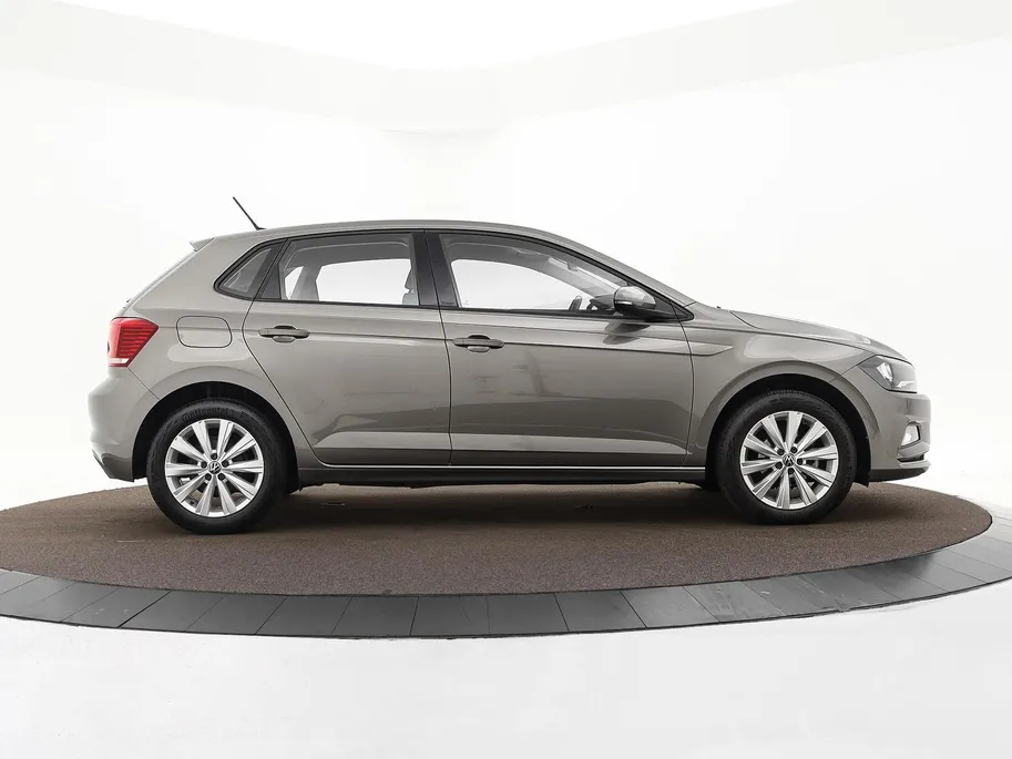 Volkswagen Polo 1.0 TSI 95pk Highline · Apple/Android Car Play · Navigatie · Clima · 16'Velgen · Sportstoelen · Draadloze Telefoonlader ·