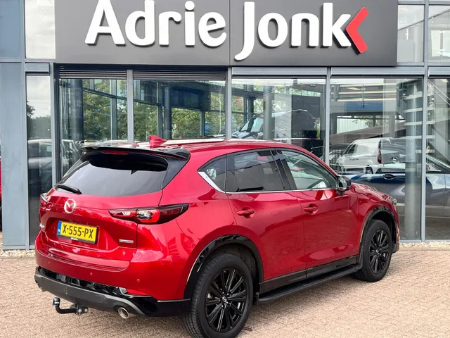Mazda CX-5 2.0 e-SkyActiv-G M Hybrid 165 Homura Comfort Pack AUTOMAAT | TREKHAAK | LEDER | 360gr CAMERA | Bose AUDIO | STOELVENTILATIE | STOEL- en STUURVERWARMING | 1e EIG |