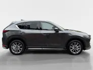 Mazda CX-5 2.0 SkyActiv-G 165 Signature | Schuif/kanteldak | 360 graden camera | Wegklapbare Trekhaak | Adaptieve Cruise Control | Navigatie | BOSE | Leder | 19' Lichtmetalen velgen