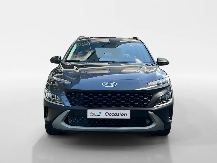 Hyundai Kona 1.6 GDI HEV Fashion Design Sky 105PK | 1ste eigenaar | Navigatie | Apple Carplay & Android Auto | Adaptive cruise control | Trekhaak | Schuif- kanteldak | Parkeersensoren achter | Stoelverwarming voor |
