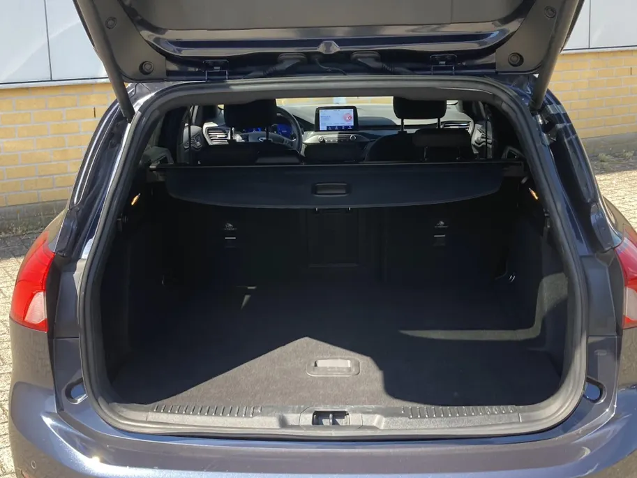 Ford Focus 1.0 EcoBoost 125 pk Hybrid ST Line X Wagon Trekhaak - Navigatie - B&O -Apple Carplay/ Android Auto - Blue Panther Metallic - Elktrische achterklep