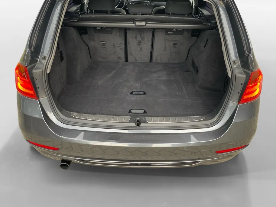 BMW 3 Serie Touring 316i Executive Sport NL Auto | unieke km.stand | navigatie | lm velgen | cruise | etc.
