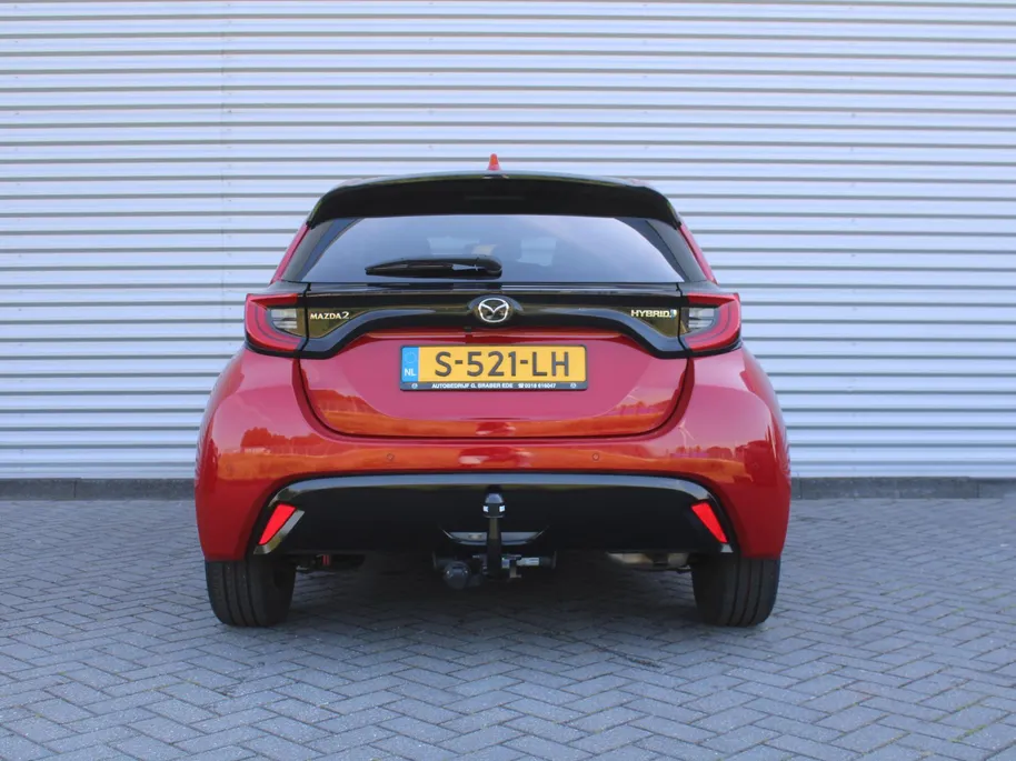 Mazda 2 Hybrid 1.5 Select | Trekhaak | Stuur-/stoelverwarming | Camera | HUD | Telefoonlader | Dodehoek detectie | Cruise adapt. | Clima | 16' LM |