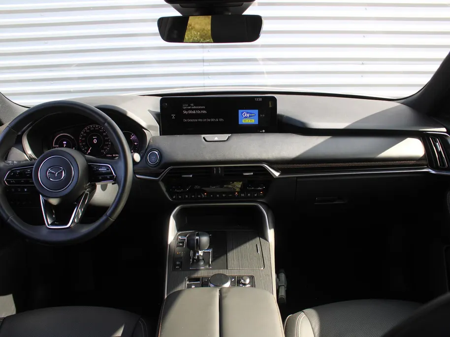 Mazda CX-80 2.5 e-SkyActiv PHEV Homura Plus | Stuur-/stoelverwarming+ventilatie | Schuifdak | Leer | HUD | Elek. stuur-/stoelverstelling | Camera rondom | 20' LM |