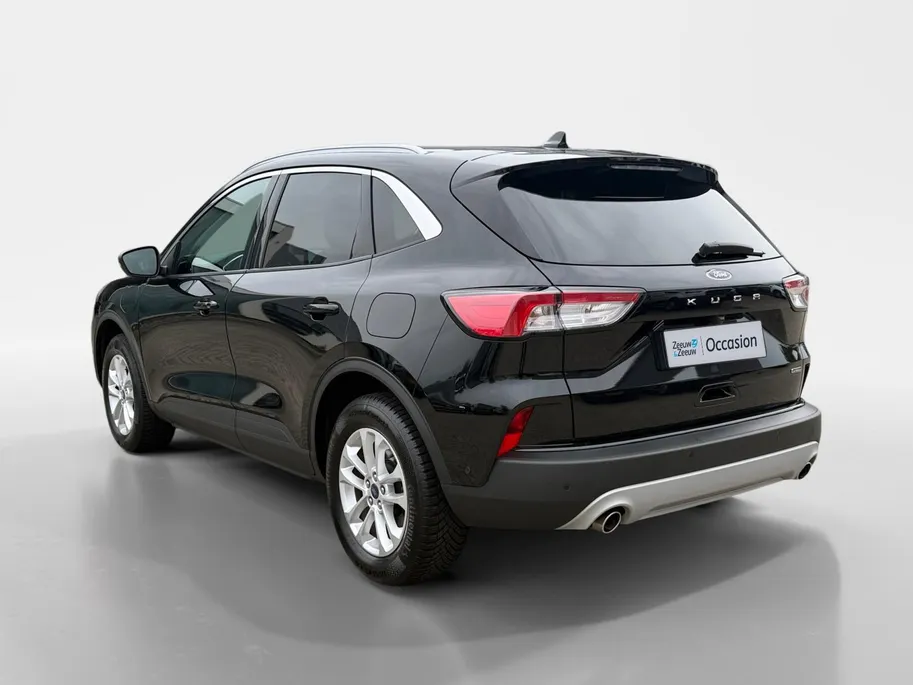 Ford Kuga 2.5 PHEV Titanium | Dealer Onderhouden | SOH 91% | El. Trekhaak | Adapt. Cruise Control | BLISS | Achteruitrijcamera | Parkeersensoren voor & achter | Winterpakket | All Season Banden