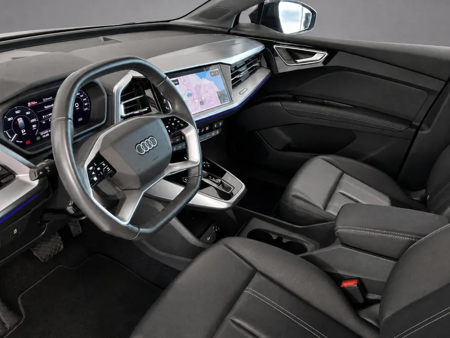 Audi Q4 e-tron 40 82 kWh 150kW/204PK · Leder · Stoelverwarming · Parkeersensoren · Garantie t/m 30-03-2026 of 90000km.