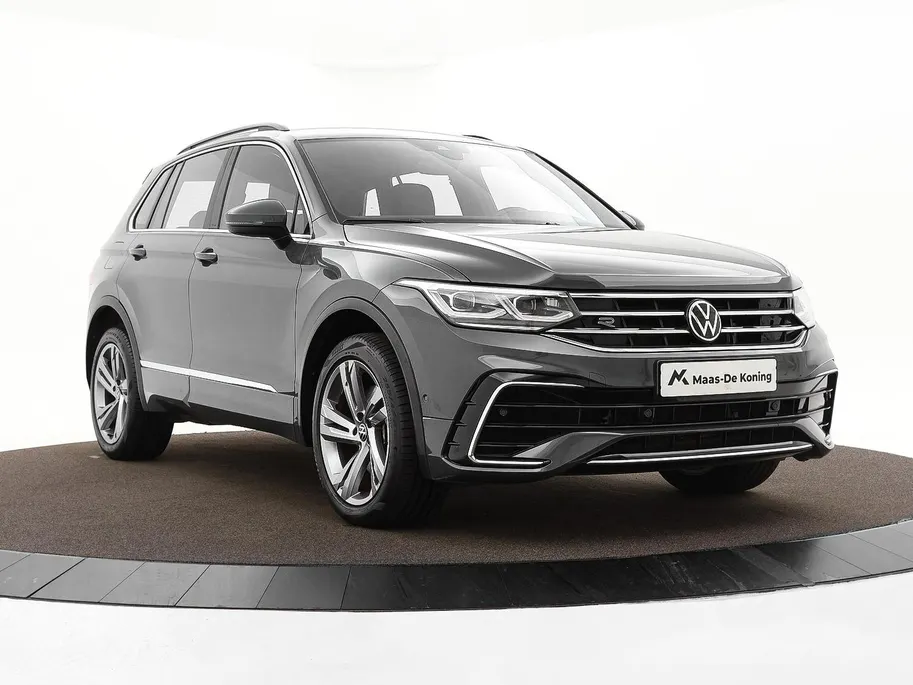 Volkswagen Tiguan 1.4 TSI 245pk DSG eHybrid R-Line Business · Apple/Android Car Play · Wegklapbare Trekhaak · Alarm · Dodehoek Detectie · Stoel-& Stuurverwarming · 19'' Inch ·