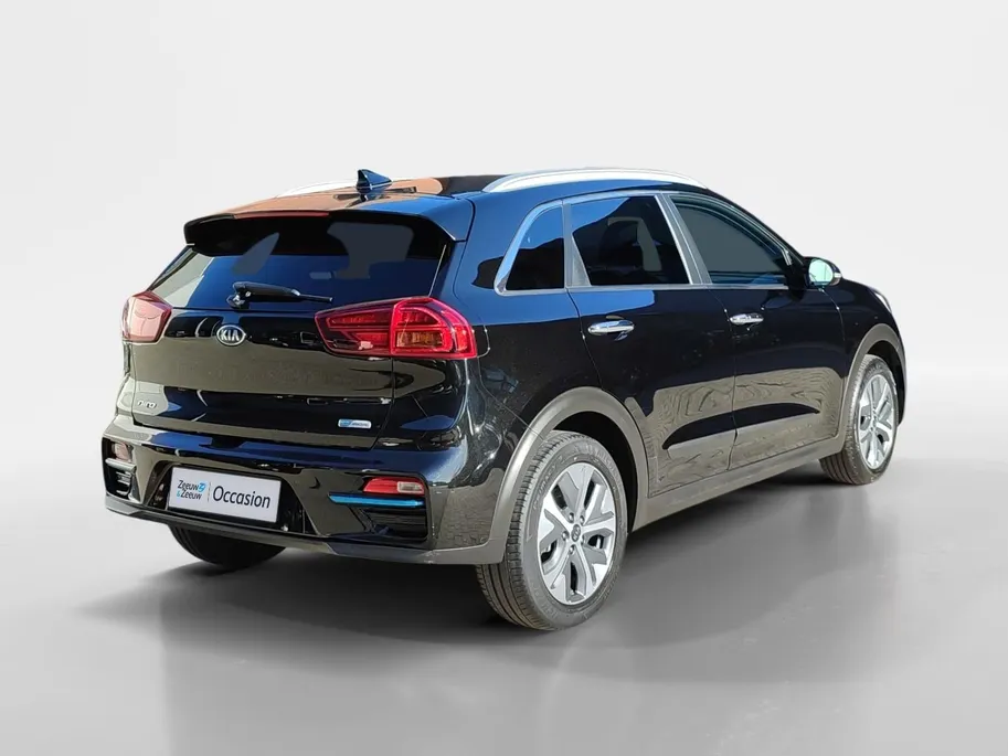 Kia e-Niro DynamicPlusLine 64 kWh | Warmtepomp! | Apple Carplay / Android Auto | Navigatiesyteem | Elektrisch Verstelbare Voorstoelen | Bestuurdersstoel + Geheugen | Stoelverwarming + Stoelkoeling | Stuurverwarming | Elektrisch Schuif / Kanteldak | Licht + Regensens