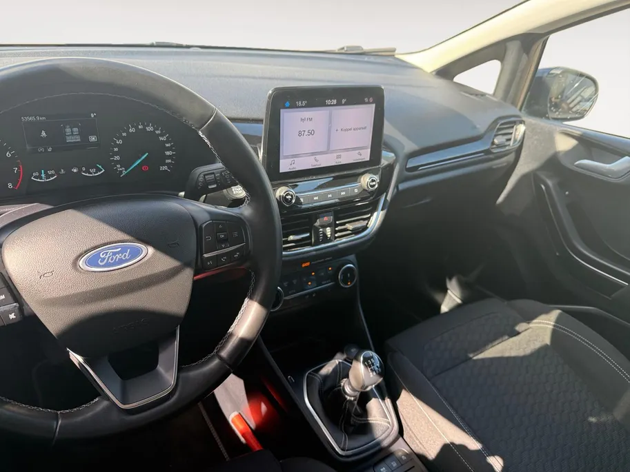Ford Fiesta 1.0 EcoBoost Hybrid Titanium | Winter Pakket | Apple Carplay & Android Auto | Parkeersensoren achter | Climate Control |