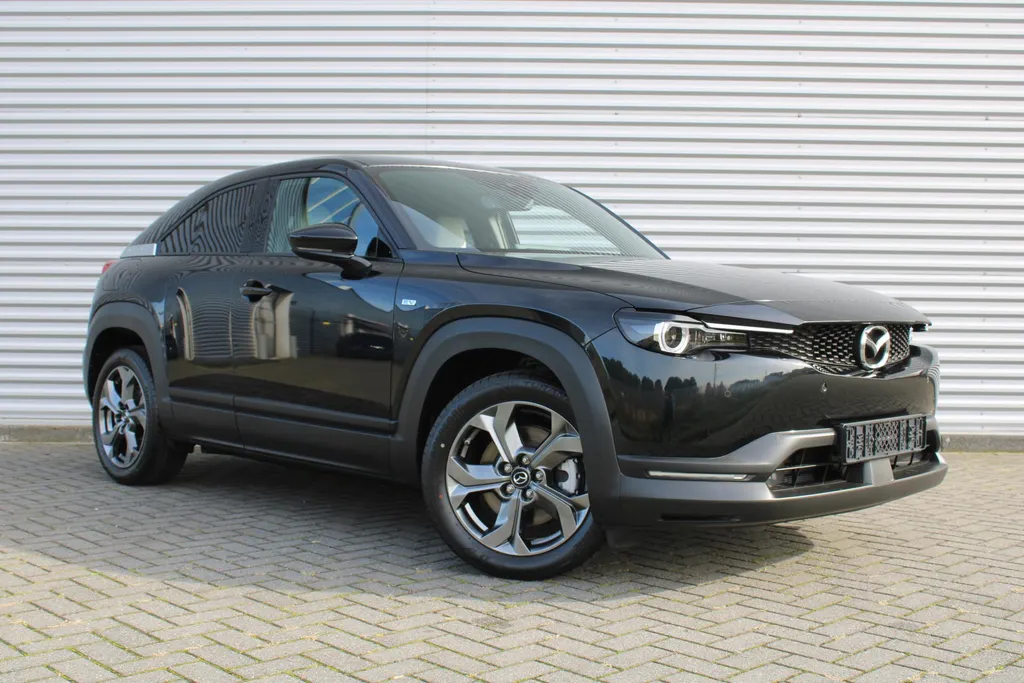 Mazda MX-30 e-SkyActiv EV 145PK Advantage Modern 36 kWh | Stoelverwarming | HUD | Dodehoek detectie | Elek. stoelverstelling | LED | 18' LM | Camera |