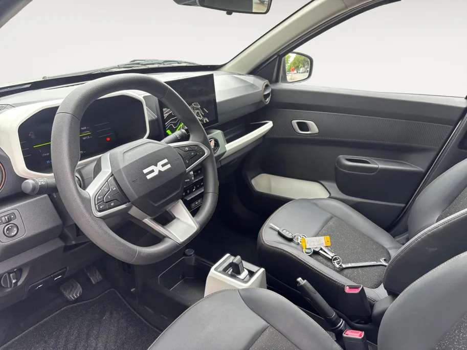 Dacia Spring Extreme 65 26.8 kWh AUTOMAAT NAVI AIRCO CAMERA APPLE CARPLAY ANDROID AUTO PAS 1600KM ZEER MOOIE AUTO GELIJK LEVERBAAR