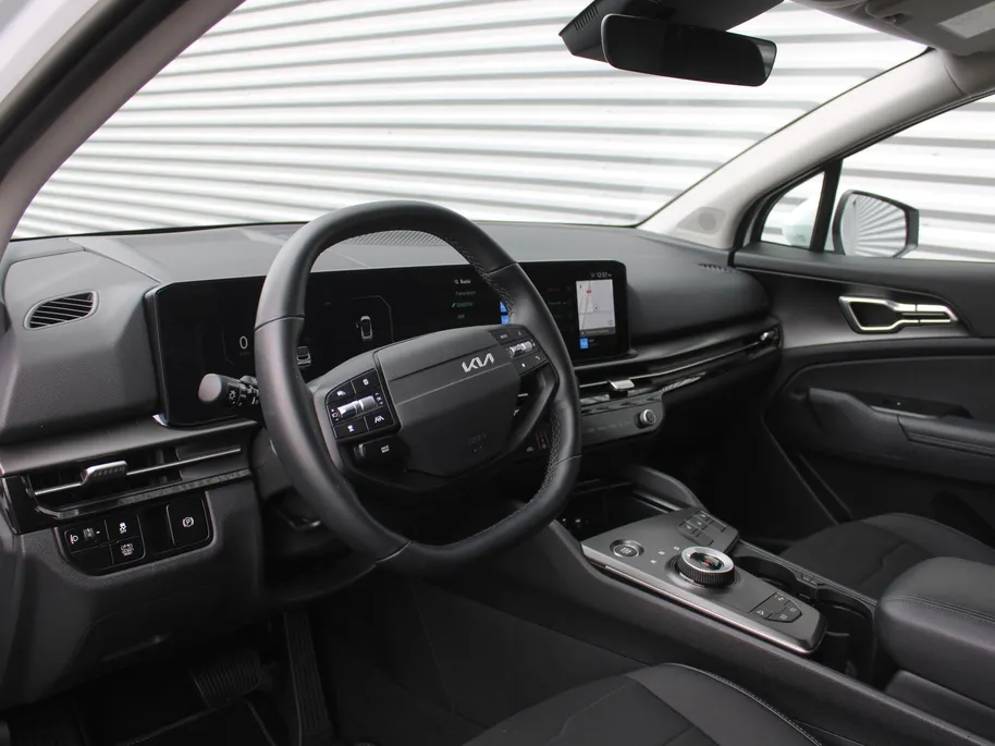 Kia Sportage 1.6 T-GDi Hybrid DynamicLine | Stuur-/stoelverwarming | Camera | Elek. stoelverstelling | Cruise adapt. | LED |  Telefoonlader | 18' LM | Clima |