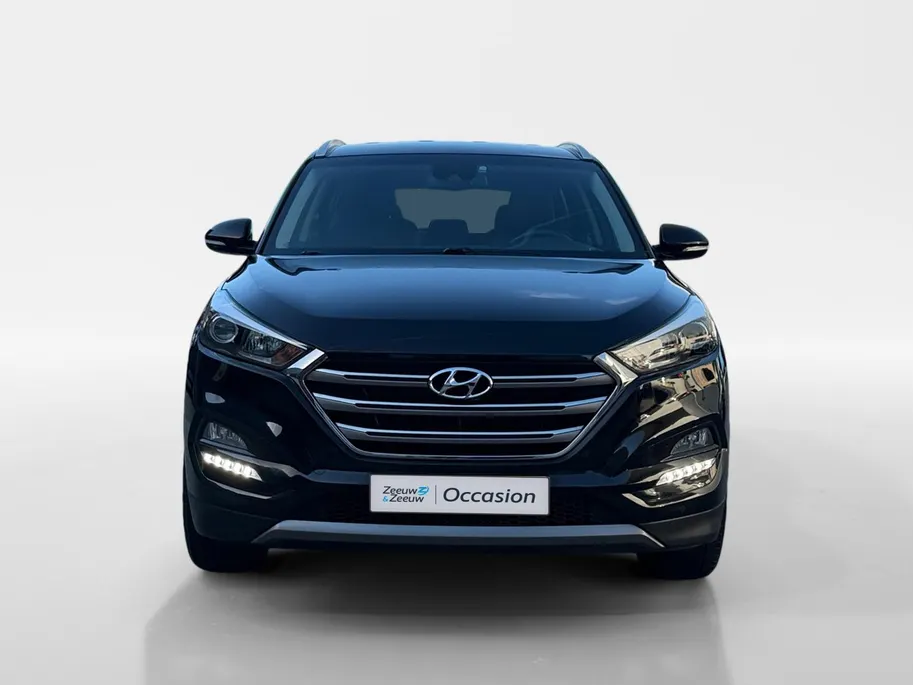 Hyundai Tucson 1.6 GDi Comfort | Elektrisch Verstelbare Stoelen | Navigatie | Bluetooth | Camera | Stoelverwarming | Cruise & Climate Control | Onderhoudshistorie | All Season Banden | 12 Maanden BOVAG Garantie