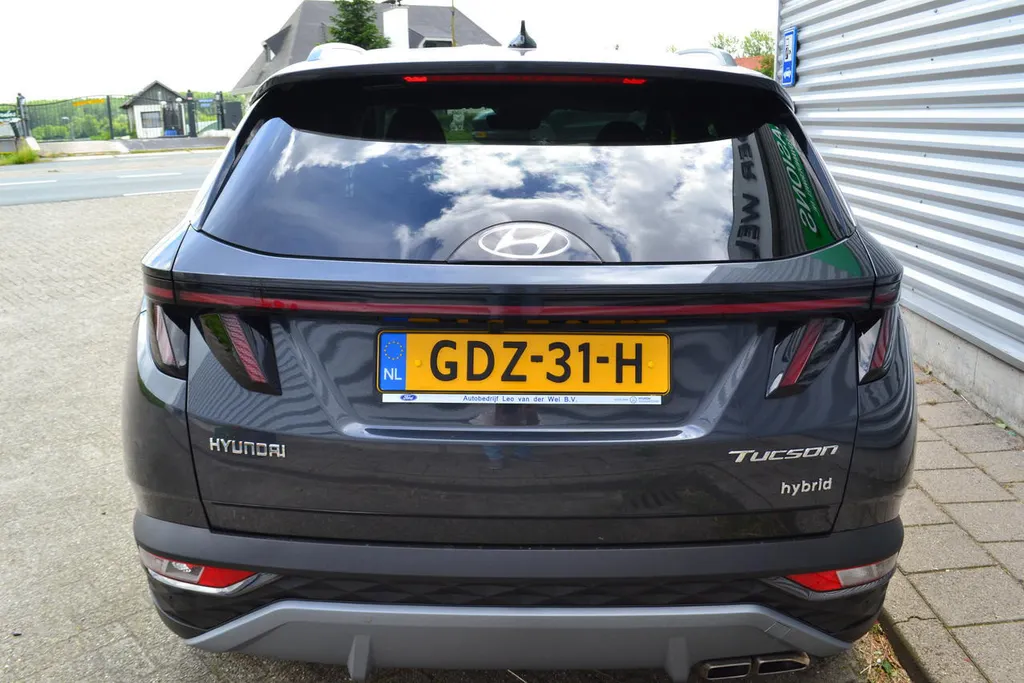 Hyundai Tucson 1.6 HEV PREMIUM|LEER|NAVI|1650KG TREKGEWICHT