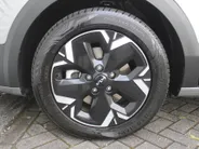 Kia Niro EV Light Edition 64.8 kWh | Airco | Cruise | Navi | Camera | PDC | 17' LM | All season banden | 17% bijtelling |