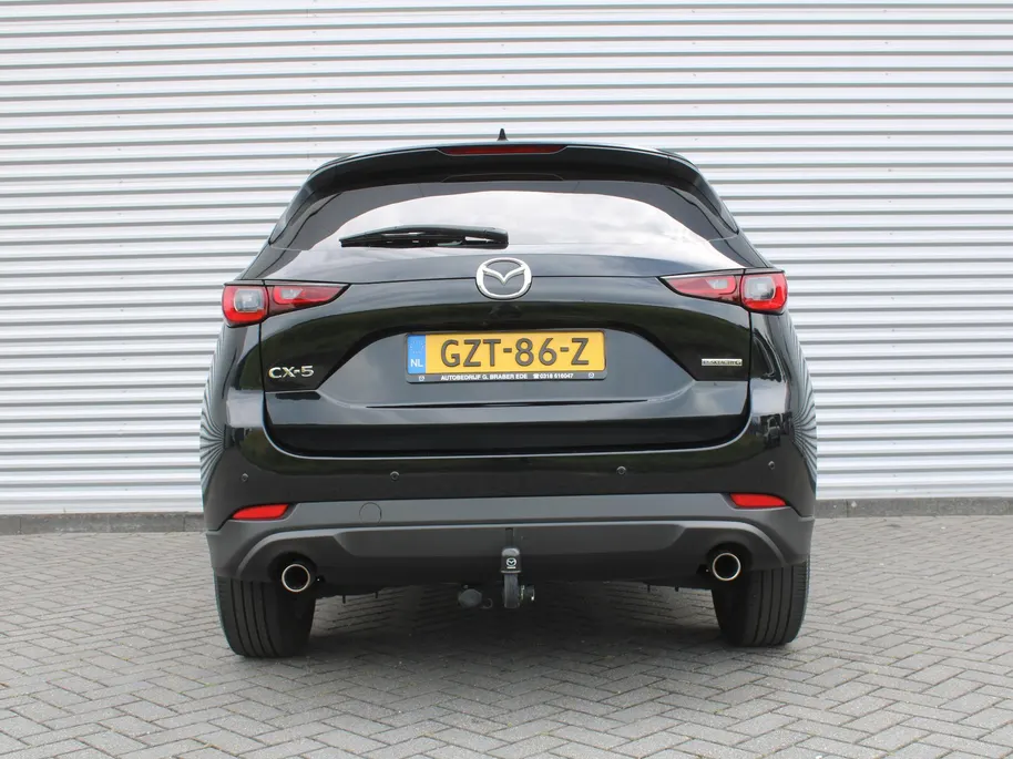 Mazda CX-5 2.0 e-SkyActiv-G AT M Hybrid 165PK Centre-Line C+C | Trekhaak | LED | Navi | Clima | Camera | Dodehoek detectie | Stoel-/stuurverwarming | PDC | 17' LM |
