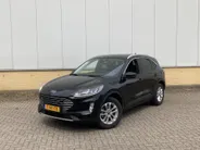 Ford Kuga 2.5 PHEV 225 pk Titanium Winter Pack - Draadloos opladen telefoon Origineel NL auto met weinig km.