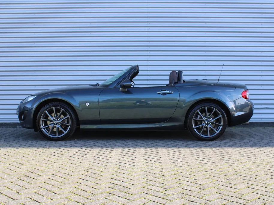 Mazda MX-5 Roadster Coupé 1.8 Hanabi | Stoelverwarming | Leer | Navi | 17" LM | Cruise | Clima | Hardtop | Nieuwstaat | Ned. auto |