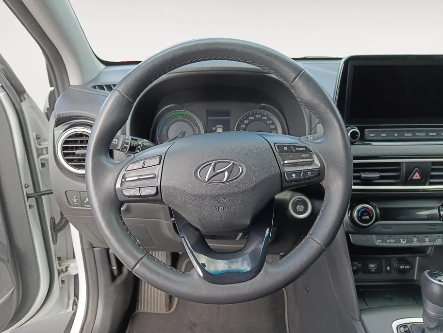Hyundai Kona 1.6 GDI HEV Premium | Trekhaak | Apple Carplay/Android Auto | Adaptive cruise control | Dodenhoek herkenning | Leren bekleding