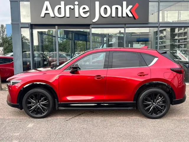 Mazda CX-5 2.0 e-SkyActiv-G M Hybrid 165 Homura Comfort Pack AUTOMAAT | TREKHAAK | LEDER | 360gr CAMERA | Bose AUDIO | STOELVENTILATIE | STOEL- en STUURVERWARMING | 1e EIG |