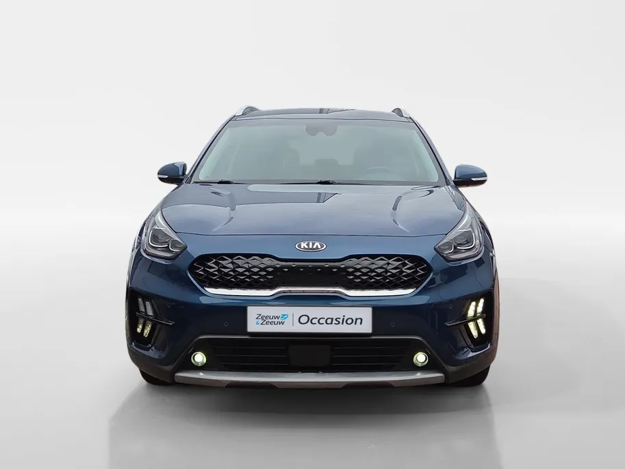 Kia Niro 1.6i Hybrid DynamicPlusLine Dealer onderhouden | Trekhaak | Stoel/stuurverwarming | Dodehoek detectie | Leder | Camera | Carplay & Android | Cruise Control Adaptief | Fabrieksgarantie t/m 23-9-2027 | NAP