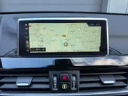 BMW X1 sDrive18i High Executive | Automaat | Head-Up Display | Automatische Achterklep | Panorama Dak | Stoelverwarming | Volledig Lederen Bekleding | Dealer Onderhouden | Camera | 12 Maanden BOVAG Garantie