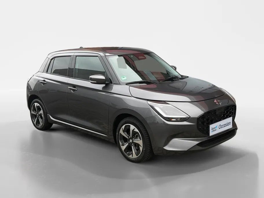 Suzuki Swift 1.2 Style Smart Hybrid 82PK | Navgiatie | Climate Control| Camera| Stoel verwarming| Metallic lak| 4 seizoen banden| Keyless start | Parkeer sensoren