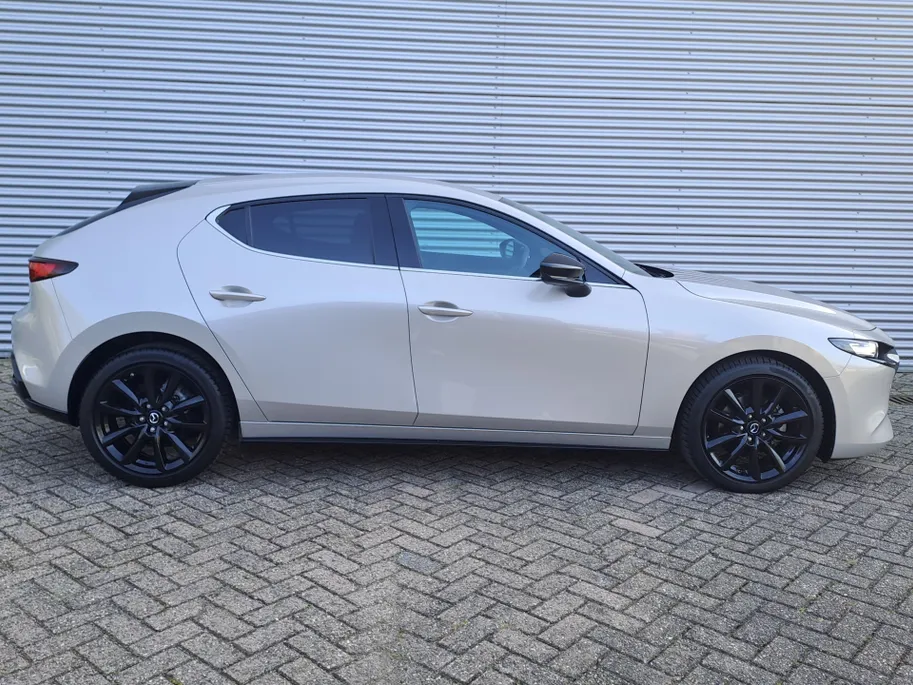 Mazda 3 2.0 e-SkyActiv-X M Hybrid 186 Nagisa | 18' LM | Navigatiesysteem full map | Cruise  | Camera  | Half Leer