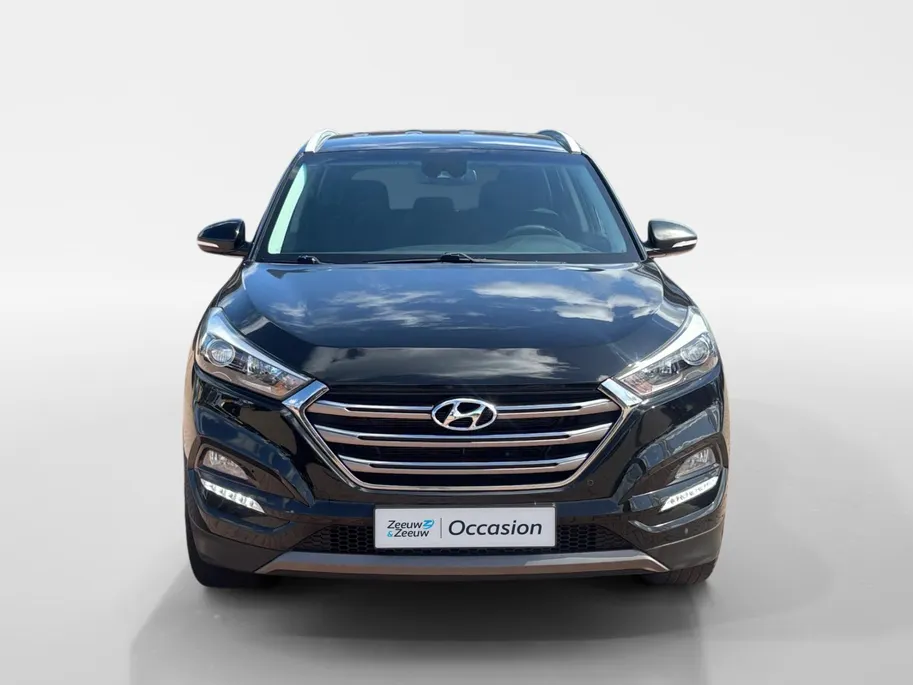 Hyundai Tucson 1.6 GDi Comfort *Navi+Camera*Climate Control*Trekhaak*Stoelverwarming*LM.Velgen*1ste eigenaar!