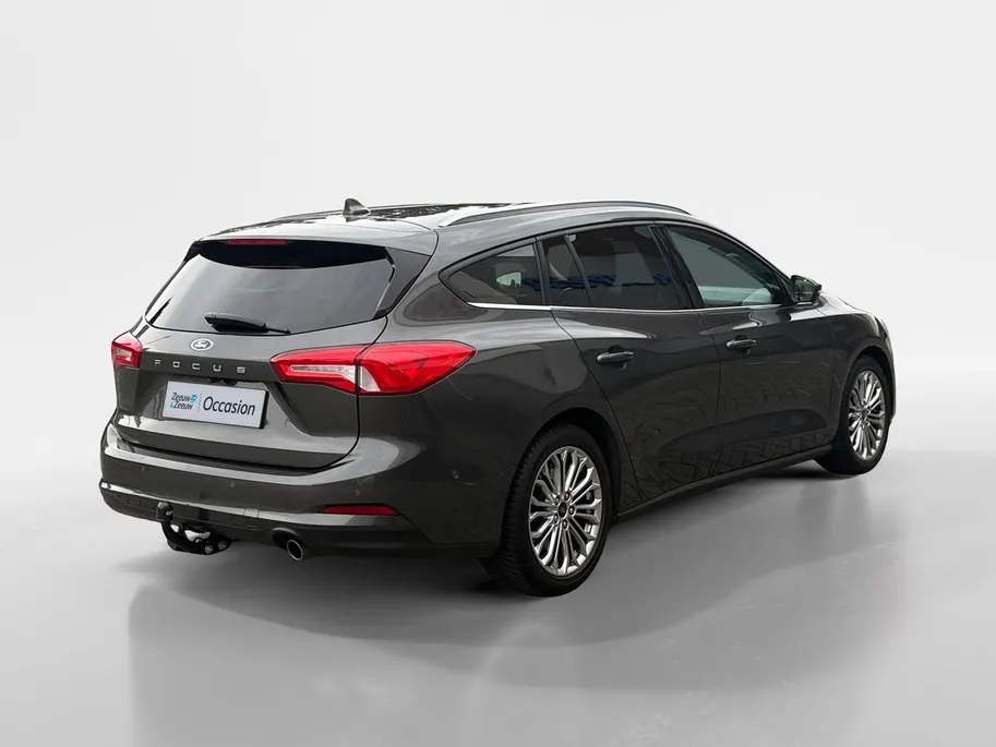 Ford Focus Wagon 1.0 EcoBoost Titanium Business | Trekhaak | HUD | Achteruitrijcamera | Winter Pack | Dodehoek detectie | Elektr. Achterklep | 12 maanden garantie! |