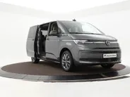 Volkswagen Multivan 1.4 218pk DSG eHybrid L2H1 Life Business · Glazen dak · Trekhaak · Camera · Elek. Schuifdeuren · Apple/Android Car Play · 7 Persoons · 18'' Inch · Garantie t/m 02-06-2028 of 100.000km