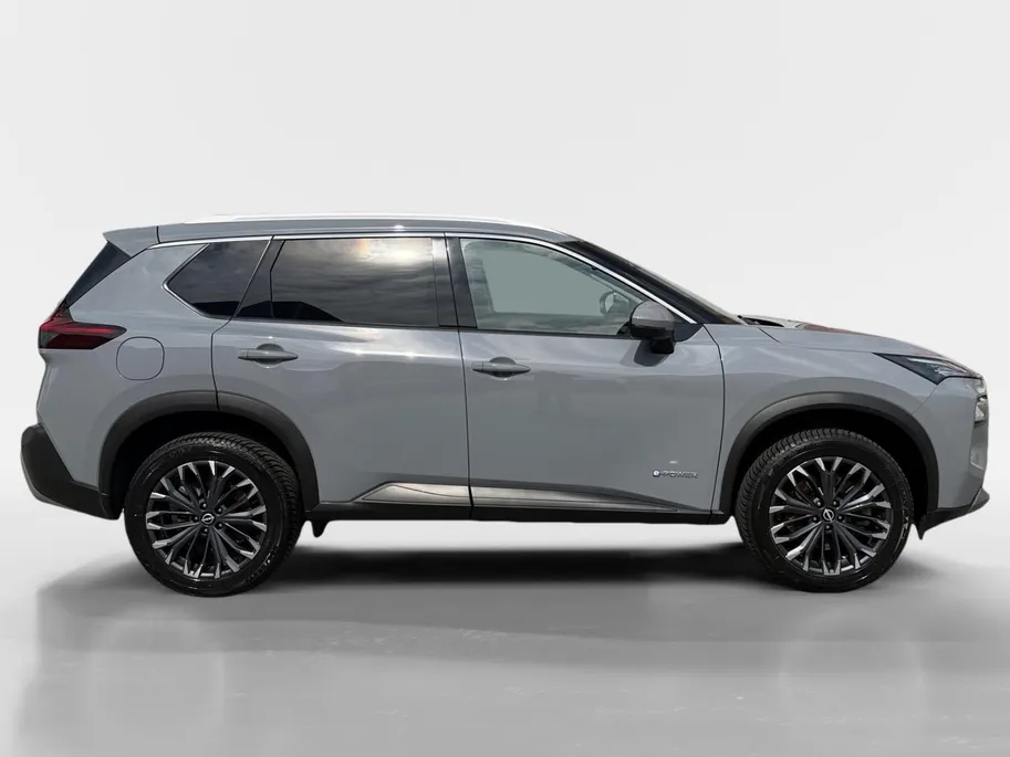 Nissan X-Trail 1.5 e-Power Tekna | Navigatie | Schuif-/ Kanteldak | Stoelverwarming voor & achter | 360 camera | Apple Carplay/ Android Auto | Geheugenfunctie voorstoelen | Elektrische Kofferbak |