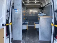 Ford Transit Custom 300 2.0 TDCI L1H2 Trend 130pk Automaat Store Van laadruimteinrichting - Speciale dak Imperiaal - 2x Schuifdeur - Trekhaak -Comfort Laadschot