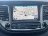 Hyundai Tucson 1.6 T-GDi Premium 4WD | STOEL VERWARMING | SCHUIFKANTELDAK | CAMERA | NAVIGATIE | ELEKTRISCHE STOEL |