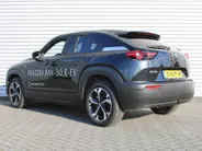 Mazda MX-30 e-SkyActiv R-EV 170 Advantage Industrial | Stoelverwarming | HUD | Dodehoek detectie | Elek. stoelverstelling | LED | 18' LM | Camera |