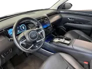 Hyundai Tucson 1.6 T-GDI PHEV Premium Sky 4WD | 66km WLTP elektrisch | Navigatie | Adaptive cruise control | Trekhaak | Apple Carplay & Android Auto | Dode hoek detectie | Draadloze telefoonlader |