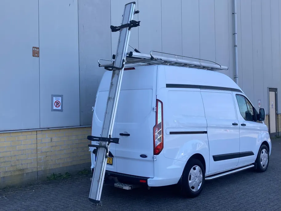 Ford Transit Custom 300 2.0 TDCI L1H2 Trend 130pk Automaat Store Van laadruimteinrichting - Speciale dak Imperiaal - 2x Schuifdeur - Trekhaak -Comfort Laadschot
