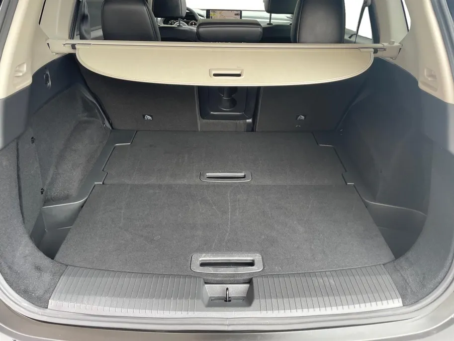 Nissan X-Trail Tekna | Navigatie | Schuif-/ Kanteldak | Stoelverwarming voor & achter | 360 camera | Apple Carplay/ Android Auto | Geheugenfunctie voorstoelen | Elektrische Kofferbak |
