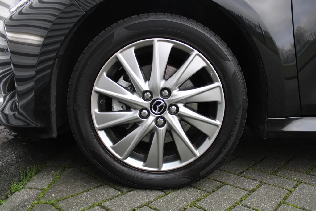 Mazda 2 Hybrid 1.5 Select | Airco | Navi | Cruise | PDC | Head-up display | Camera |
