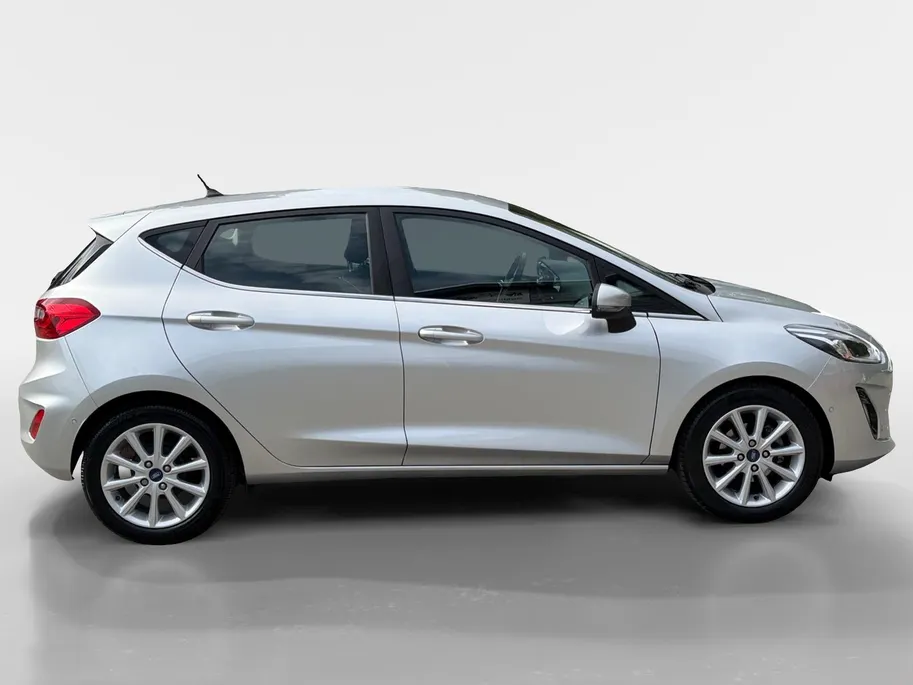 Ford Fiesta 1.0 EcoBoost Titanium | 1e Eigenaar | NL-Auto | Nieuwe distributieriem | Camera | Adaptive Cruisecontrol | Voorruitverwarming | B&O Audio | Navigatie | Apple Carplay&Android Auto | Climate Control | Dealer onderhouden |