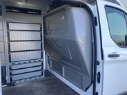 Ford Transit Custom 300 2.0 TDCI L1H2 Trend 130pk Automaat Store Van laadruimteinrichting - Speciale dak Imperiaal - 2x Schuifdeur - Trekhaak -Comfort Laadschot